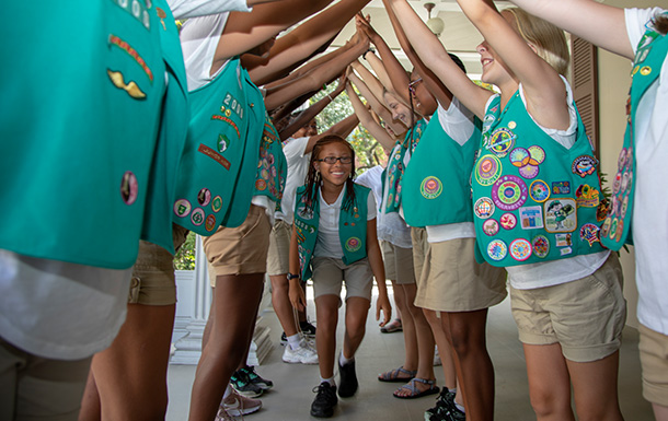 group of Junior Girl Scouts in uniform