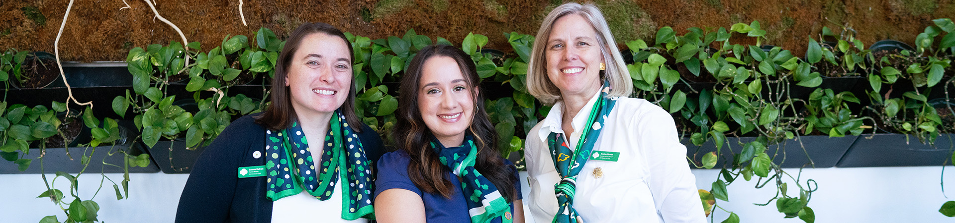  staff members posing at an event 