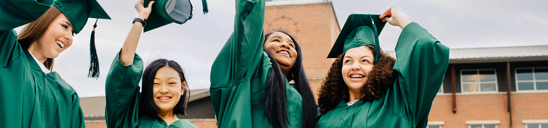  Group of girls in graduation regalia 