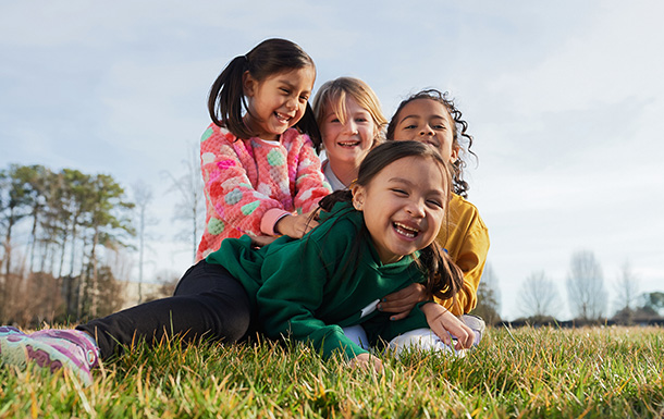 group of young girls in a field